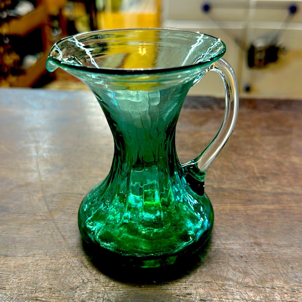 Vintage green glass creamer